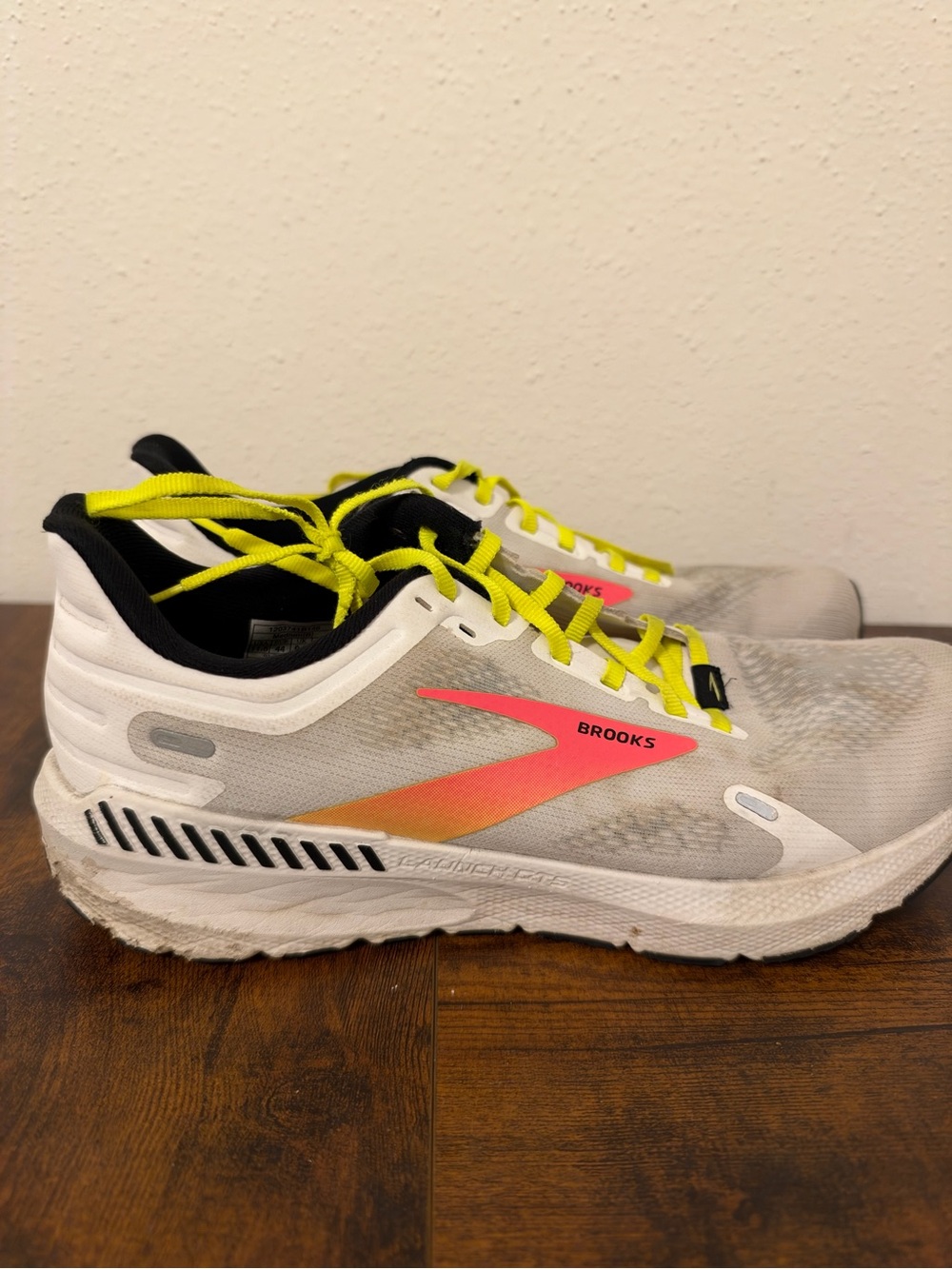 Brooks Men’s White Running Shoes with Neon Yellow Laces and Coral Accent